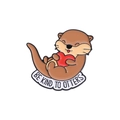 Cute cartoon enamel otter pin holding a red heart with Be Kind To Otters text - Otter Slogan Pin