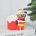 Christmas snowman candle holder in red and white with green scarf for festive decor - Snowman with Gift Bag