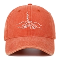 Close-up of vintage washed orange baseball cap featuring hand-embroidery on the front - Orange