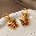 Vintage style gold-plated butterfly hoop earrings with dark red enamel and star details - T2234 Style / Butterfly
