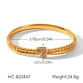 Close-up of 18k gold plated stainless steel twisted bangle with CZ inlay and dimensions - Twisted Rope Center Stone Style (HC-B20447)