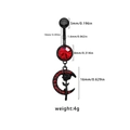 Macro detail of black navel ring with red crystal moon and rose pendant including dimensions - 24072504-2