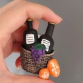 3D resin refrigerator magnet featuring a miniature basket with wine bottles and fruit - Wine and Bread Basket