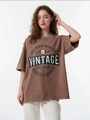 Vintage gewassen bruin oversized katoenen T-shirt met grafische print en losse pasvorm - M / Gewassen Khaki