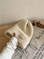 Chunky knit bear beanie in cream beige color with a small woven label for winter warmth - Alpaca Wool Slouch-Beige