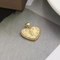 Detail of heart-shaped gold pendant featuring Virgin Mary relief with pearls and zircons - Pearl Border Heart