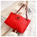 Elegant red quilted shoulder bag with gold chain strap and metal turn-lock closure - Red