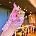 Luminous Mickey-shaped liquid quicksand keychain with pink silicone handle and gold ring - Pink Luminous Mickey Head