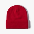 Classic red knitted beanie hat in vibrant warm acrylic for winter outdoor wear - Bright Red