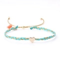 Blue and gold braided friendship bracelet with a polished gold heart pendant - Lake Blue and Gold (with Orange Tassel)