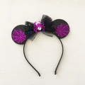 Macro shot of Halloween headband with purple spider web ears and sequined bow detail - Purple Round Ear Spider Headband