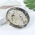 Round resin organizer tray with black stones and gold foil accents for jewelry - Obsidian
