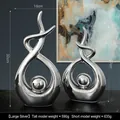 Modern abstract silver sculpture set with mirrored finish for living room decor - Abstract Twirl Silver - Pair