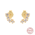 Detail of 925 sterling silver gold stud earrings with four graduated clear cubic zirconia - 4-Stone Arc-White Zirconia