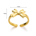 Detailed view of golden bow ring showing dimensions 15mm width and 10mm height - Classic Bowknot Style (JZ6359) / Gold