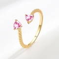 Adjustable golden open ring featuring two pink heart-shaped stones and milgrain details - November (Pink)