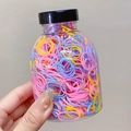 Colorful disposable elastic hair bands stored in a clear plastic bottle with black cap - 1000Pcs/Jar / 7# Multicolor