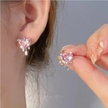 Close-up of pink heart-shaped crystal earrings with a melted silver metal design - Melting Heart Pink Gemstone Style (2609)