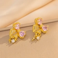 Elegant gold bow earrings with pink heart stones and zircon accents on beige silk - Gold Pink Stud Earrings