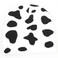 Detailed view of knitted winter beanie featuring classic black and white cow print pattern - One Size(Elastic) / Cow Print