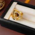 Close-up of vintage gold tiger eye ring in a gift box showing hammered metal texture - Irregular Hammered Wide Style (WR441) / Gold-Brown (Tiger Eye)