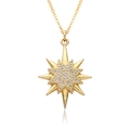 Macro view of gold-plated starburst necklace pendant with micro-paved cubic zirconia crystals - Octagonal Star Flower Style (c491)