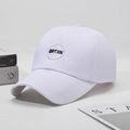 White cotton baseball cap with circular BRTXN embroidery and curved brim for sun protection - One Size(Adjustable) / White
