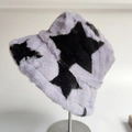 Fuzzy light purple bucket hat featuring black star patterns in soft faux fur plush - Purple with Black Stars