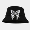 Gros plan d'un chapeau bob en coton noir avec un motif graphique papillon effet miroir - Noir