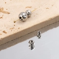 Close-up of silver hammered texture metal beads on a pin with a textured stone background - Hammered Irregular Ball (3#) / 4mm