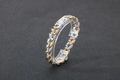 Two-tone silver and gold stainless steel Cuban link bracelet with engraved floral patterns - Gold & Silver