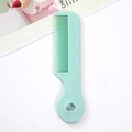 Mini macaron green portable hairbrush with creative heart-shaped cutout handle - Individual Packaging / Simple Mini Comb/Mint Green