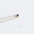 Minimalist gold necklace with square black and gold pendant featuring letter Y engraving - Letter Y