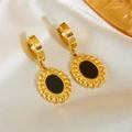 Elegant gold oval earrings with black inlay on white silk background luxury style - Black Stud Earrings (A713)