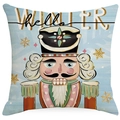 Close-up of nutcracker soldier print on pink linen Christmas pillow case with snowflakes - Light Blue-Nutcracker Pattern