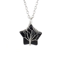 Macro view of star-shaped black stone pendant with silver tree of life wire wrapping - Silver + Obsidian