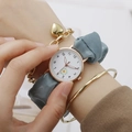 Women's quartz watch with daisy dial, blue silk strap and gold heart charm bracelet - Sea Blue Set