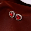 Macro shot of red heart earrings with diamond accents on dark red silk background - Heart-shaped Red Ruby Stud Earrings (With 925 Silver Needle) / Gold/Red