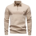 Détail d'un pull en coton haut de gamme avec demi-zip, col montant et petite étiquette - S / Abricot