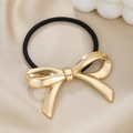 Chic gold metallic bow hair tie with high elastic black band on a satin background - Gold Large Smooth Bow
