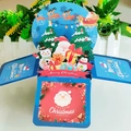 3D pop-up Christmas card box featuring Santa, snowman, and reindeer in blue and red - Blue Christmas