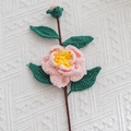 Handmade crochet pink camellia flower bouquet with green leaves and yellow stamens - Camellia Pink