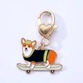 Corgi on skateboard keychain with gold heart lobster clasp in enamel alloy finish - Skating Dog