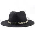 Close-up of black straw fedora featuring a faux leather band with a bull head metal emblem - M (56-58cm) / Navy Blue