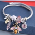 Bracelet perlé bohème avec fleur en cristal rose et pendentif abeille sur cordon argenté - Rose