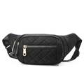 Classic black quilted waist bag with diamond stitching and adjustable strap in white background - Black