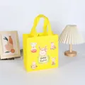 Sac cadeau de Pâques jaune écologique en non-tissé avec illustrations de lapins - XH45-Vertical