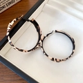 Detail shot of leopard print acrylic hoop earrings in a black gift box on a wooden desk - 29# Coffee - Leather Leopard Wrapped Round Teardrop Hoop (5mm)