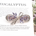 Pince à cheveux nœud en cristal violet élégante avec strass sur monture argentée - Pompon / Violet
