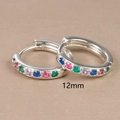 Macro shot of 12mm silver hoop earrings with multicolored cubic zirconia stones - 12mm / Silver